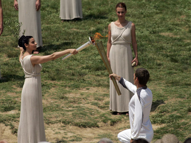 Olympic torch is lit - Photo 1 - Pictures - CBS News