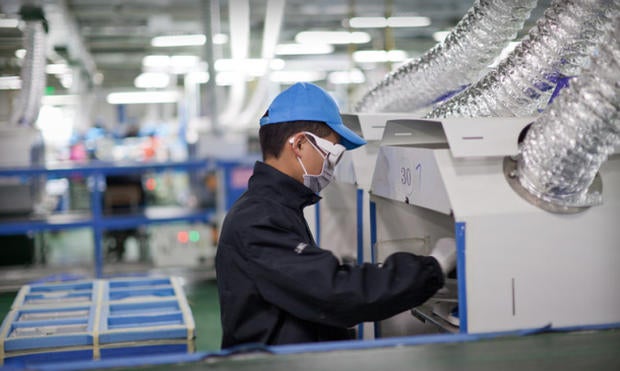 A worker at a supplier facility in Chengdu, China.
