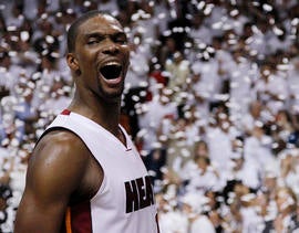 Chris Bosh reacts after Game 5