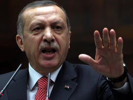 Turkish Prime Minister Recep Tayyip Erdogan addresses members of his Justice and Development Party at the parliament in Ankara, Turkey, June 26, 2012.