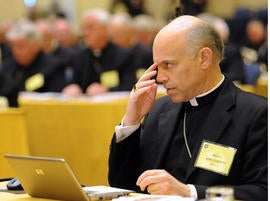 Bishop Salvatore Cordileone of Oakland, Calif. makes the sign of the cross during the fall meeting of the U.S. Conference of Catholic Bishops Monday, Nov. 15, 2010 in Baltimore.