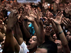 Egyptian protesters chant anti-U.S. slogans in front of the U.S. Embassy in Cairo Sept. 11, 2012.