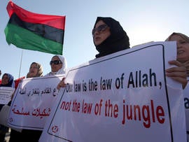 Libyan women protest against Ansar al-Shariah Brigades and other Islamic militias in front of the Tebesty Hotel in Benghazi, Libya, Sept. 21, 2012.