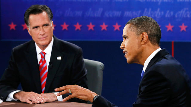 Republican presidential nominee Mitt Romney listens to President Barack Obama speak during the third presidential debate at Lynn University, Monday, Oct. 22, 2012, in Boca Raton, Fla. 