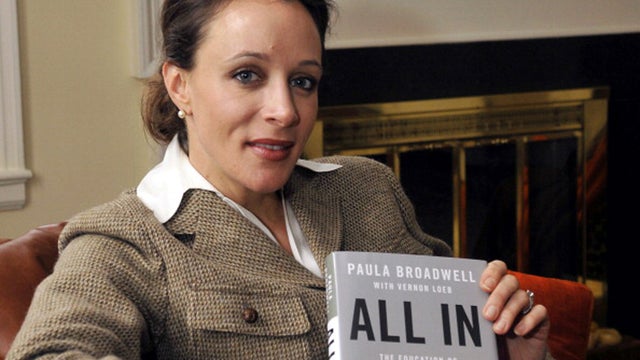 Paula Broadwell, author of the David Petraeus biography 'All In,' poses for photos in Charlotte, North Carolina