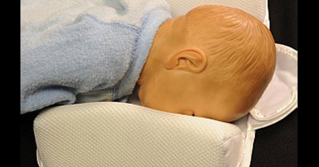 Renewed warnings of suffocation risk from infant sleep positioners