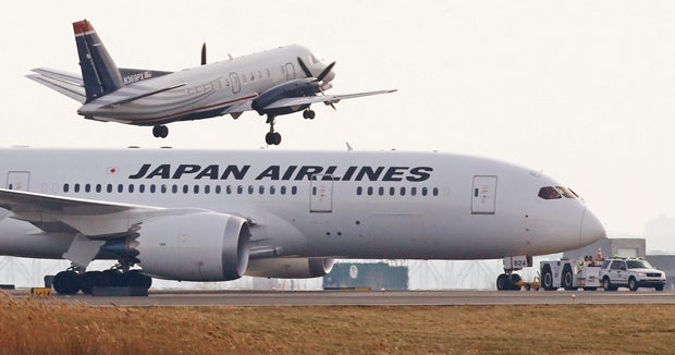 Officials in Boston contain Dreamliner jet fuel leak CBS News