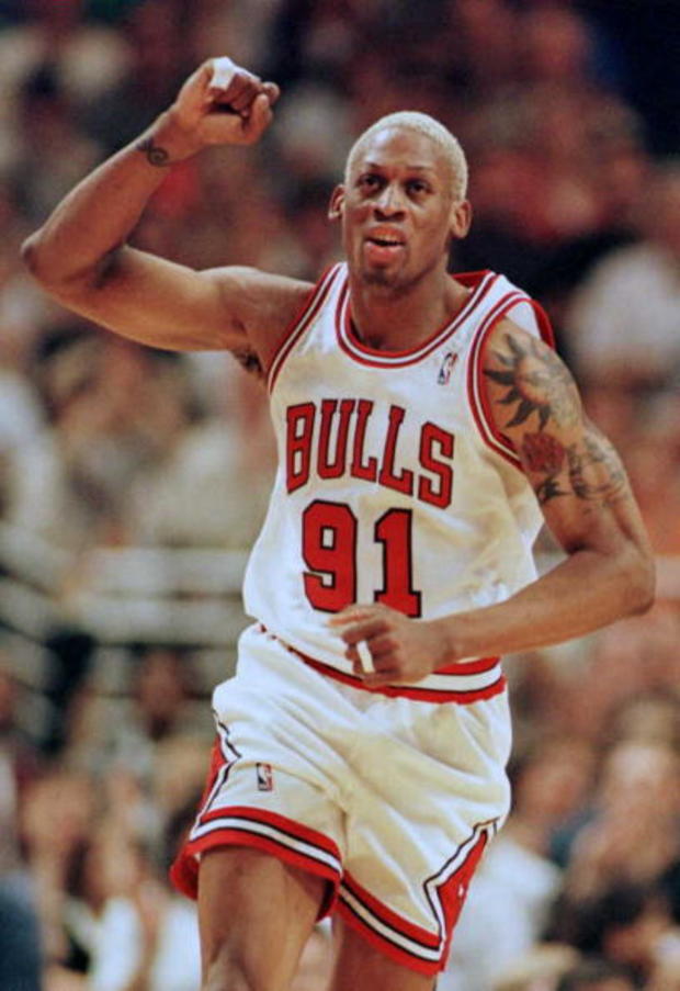 Chicago Bulls forward Dennis Rodman pumps his fist 