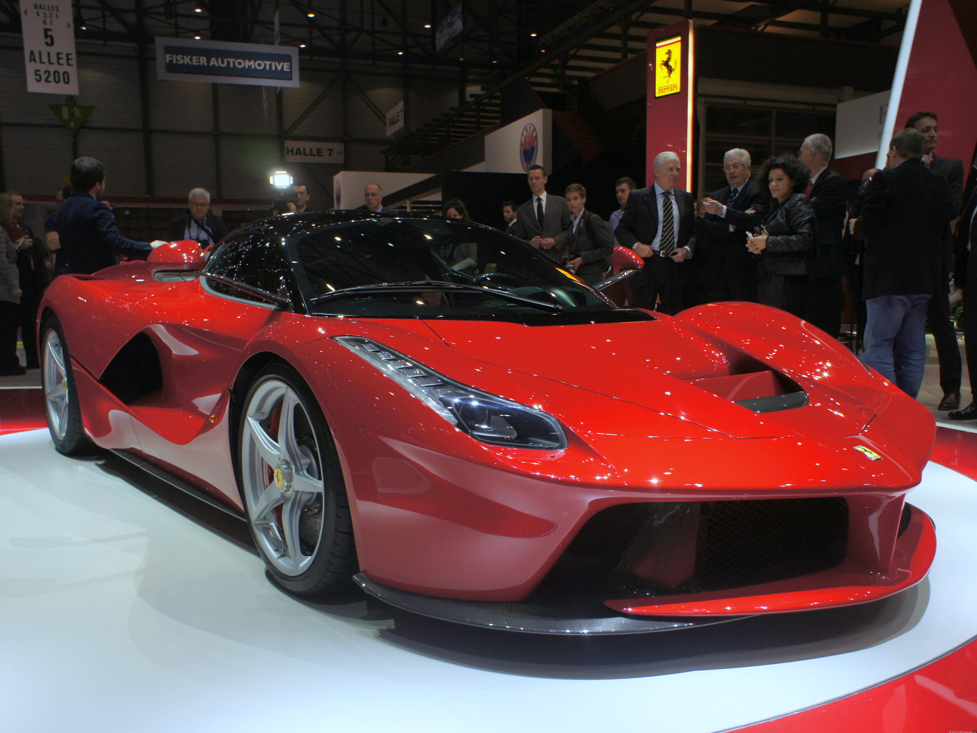 Ferrari Mclaren In Geneva Uncover Hybrid Supercars Cbs News