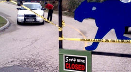 Sheriff's Deputy at Cat Haven following fatal attack.