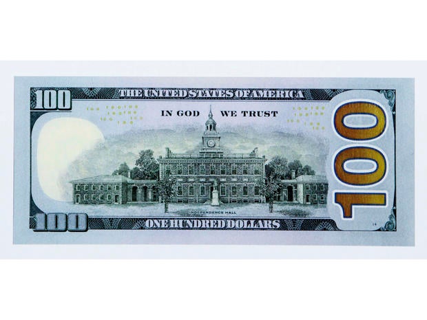 The reverse side of the new $100 bill is shown on April 21, 2010.