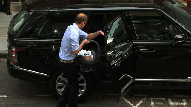 Prince William carries son to the car 