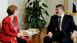 In this Wednesday, June 19, 2013 file image released by the Egyptian Presidency, Egyptian President Mohammed Morsi, right, meets with High Representative of the European Union for Foreign Affairs Catherine Ashton, at the Presidential Palace in Cairo, Egypt. Ashton held a two-hour meeting with Morsi, the EU said on Tuesday, July 29, 2013, in the Islamist leader's first meeting with an outsider since the military deposed him nearly a month ago.