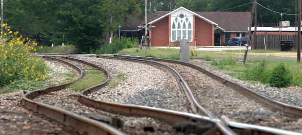 Railroad tracks wind their way through Weimar, Texas, past the Weimar United Church of Christ. The Church's beloved pastor and his wife were murdered in their home behind the church by Resendiz. Texas authorities determined they had a serial killer on the 