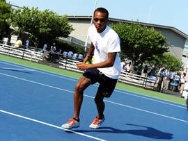 Angelo Anderson is chasing down tennis balls at the U.S. Open.
