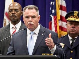 Chicago Police Superintendent Garry McCarthy, center, speaks during a news conference about a shooting Sept. 20, 2013, in Chicago.