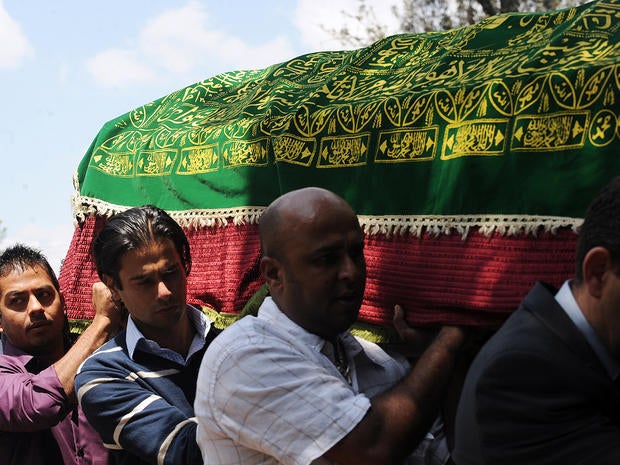 Pallbearers carry the coffin of Kenyan journalist Ruhila Adatia-Sood during a funeral ceremony in Nairobi, Kenya, Sept. 26, 2013.