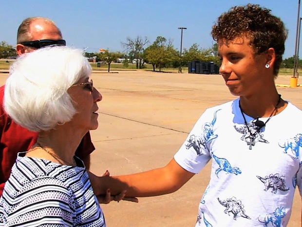 After an Okla. woman was robbed as she mourned the loss of her husband, the mugger's son knew he had to make up for his father's crime.