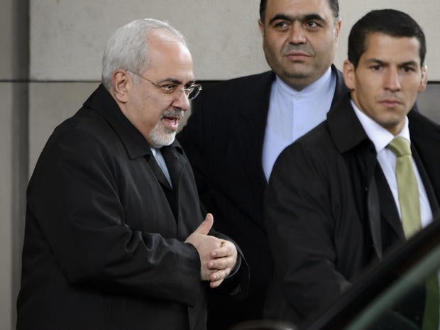 Iranian Foreign Minister Mohammad Javad Zarif leaves his hotel before the start of closed-door nuclear talks in Geneva