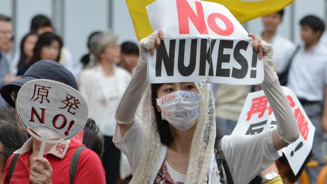 Protesters stage a demonstration march in Tokyo, June 28, 2014, against re-opening the Sendai nuclear power plant 