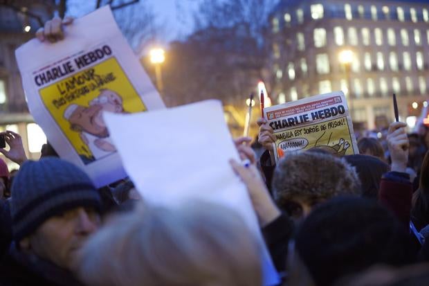 Thousands react to Paris shooting 