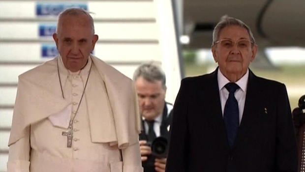 Pope Francis stands with Cuban President Raul Castro after arriving in Havana Sept. 19, 2015.