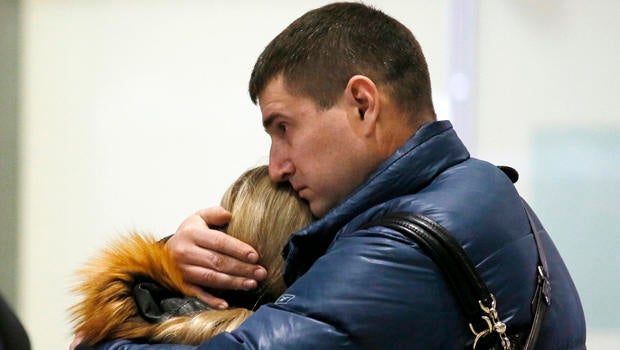 Relatives react after a Russian airliner with 217 passengers and seven crew aboard crashed as people gather at Russian airline Kogalymavia's information desk at Pulkovo airport in St. Petersburg, Russia, Oct. 31, 2015.
