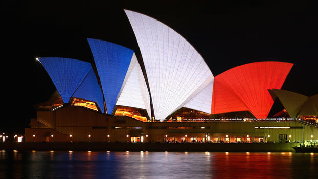 Landmarks light up in solidarity with France 
