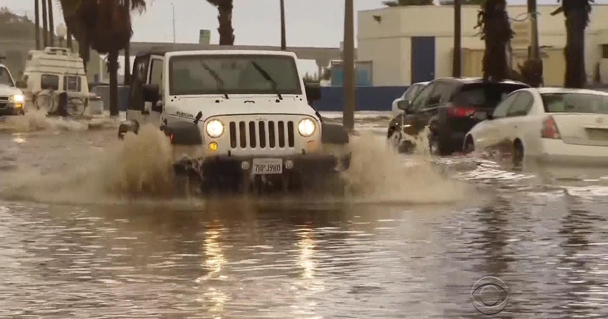 New El Niño Storm Drenches Disrupts California Cbs News