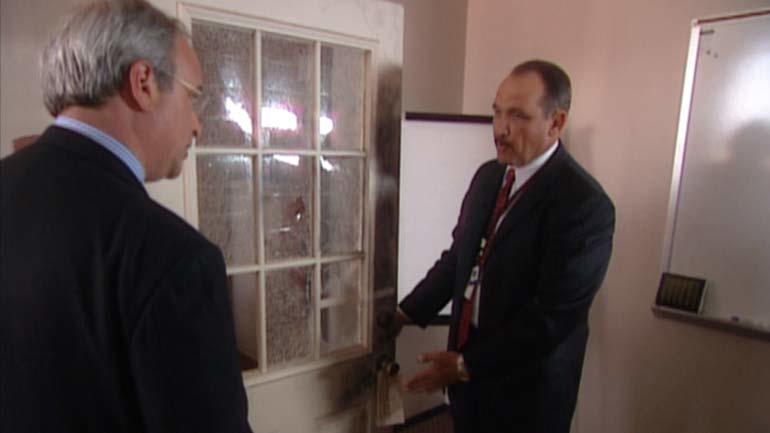 Holtke and Schlesinger with door