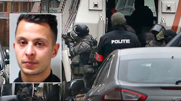 Police are seen at the scene of a security operation where Salah Abdeslam, inset, was arrested in the Brussels suburb of Molenbeek in Brussels, Belgium, March 18, 2016.