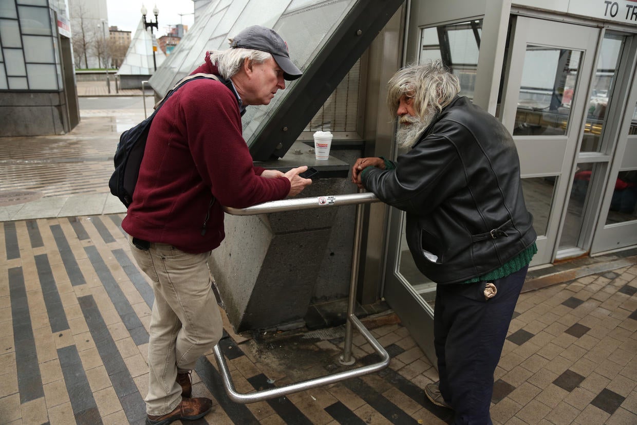 Dr. Jim O'Connell talks to a patient House calls for the homeless