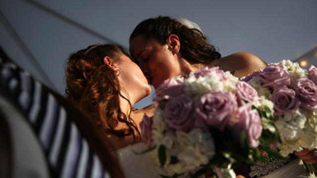 Melissa Adams, 32, right, and Meagan Martin, 30, kiss after their wedding ceremony on July 11, 2015, in Lexington, South Carolina. 