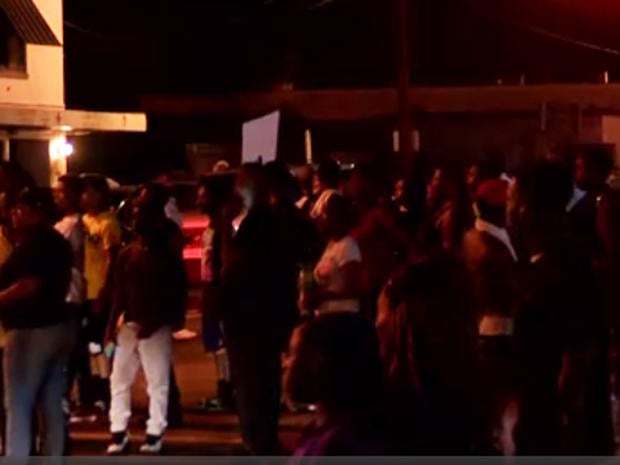 Demonstrators protesting late on July 5, 2016 outside convenience store after suspect was shot and killed by Baton Rouge, Louisiana police much earlier in the day