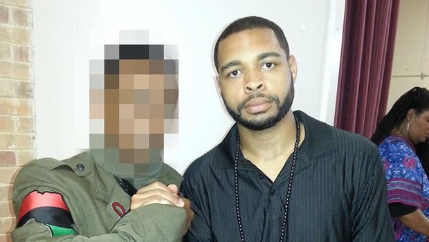 Micah Xavier Johnson, right, is seen in a photo obtained by CBS News.