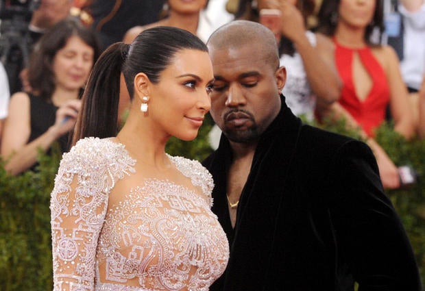 May 2015 file photo shows Kim Kardashian and Kanye West arriving at The Metropolitan Museum of Art's Costume Institute benefit gala in New York