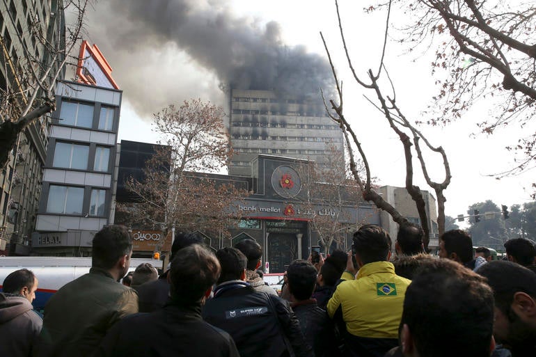 iran-tehran-building-collapse-fire-ap-17019312891145.jpg