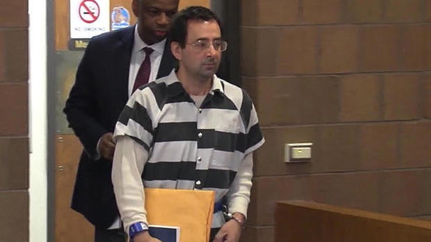 cbsn-fusion-former-usa-gymnastics-doctor-larry-nassar-charged-in-alleged-assault-of-9-minors-thumbnail-1256453-640x360.jpg