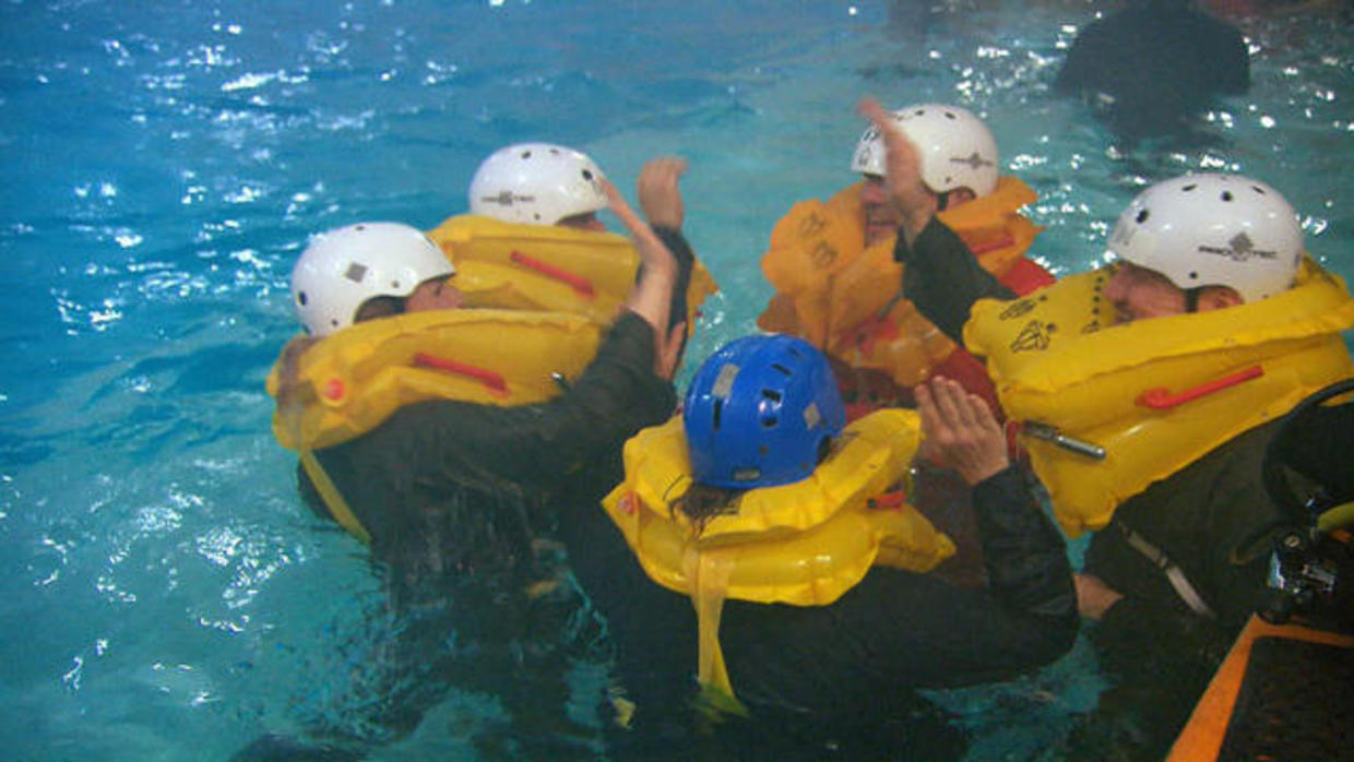 Unique team bonding ideas: Water survival classes - CBS News