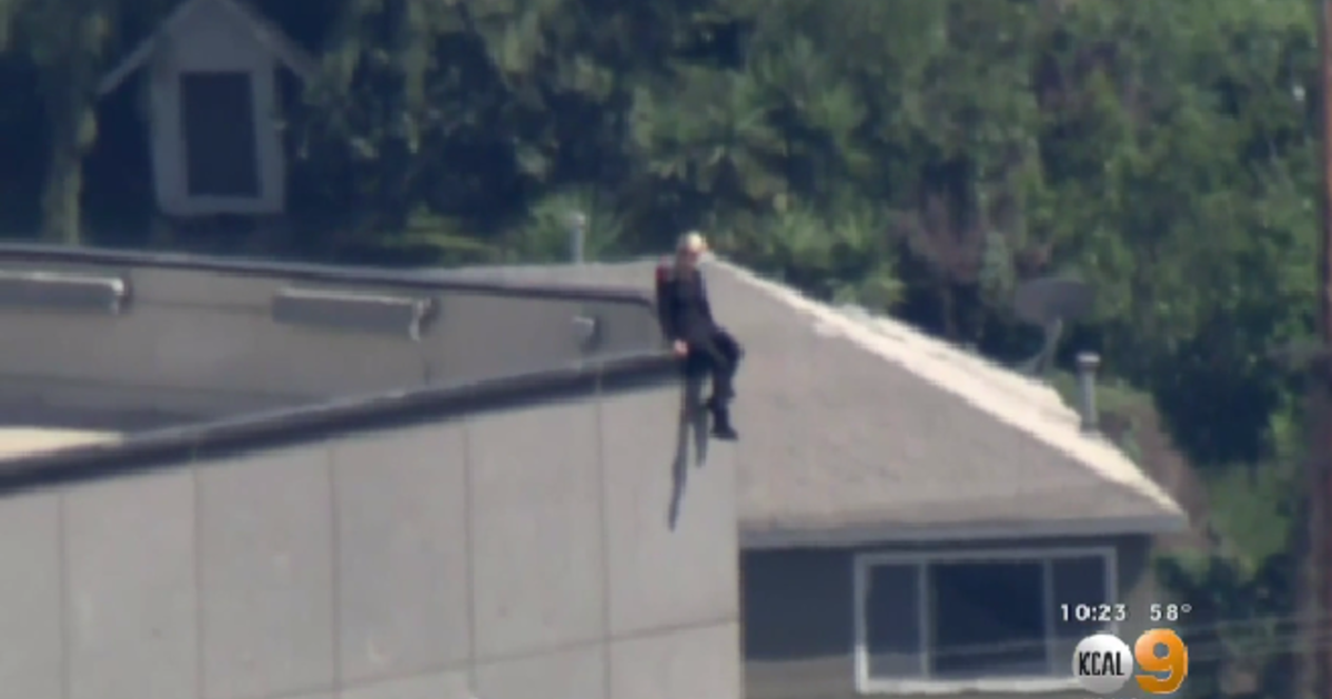 First responders rescue woman threatening to jump from 22story