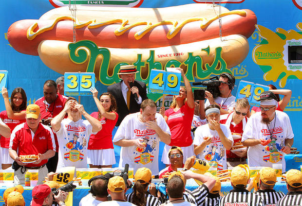 Top Speed Eaters Compete In Nathan's Hot Dog Eating Contest 