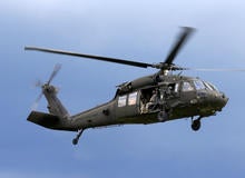 U.S. Army soldiers get ready to land a Black Hawk helicopter during an exercise in Mikyciai, Lithuania, June 17, 2017.