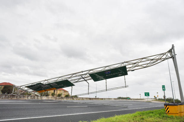 A collapsed overhead gantry lies across Interstate 37, blocking the highway due to damage caused by Hurricane Harvey in Corpus Christie 