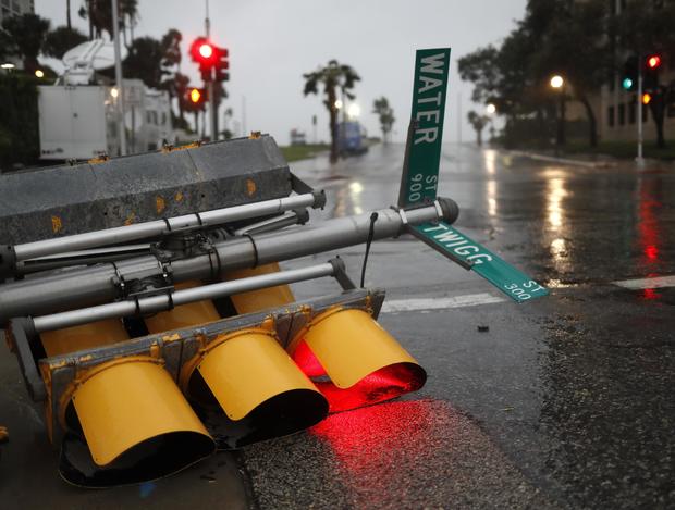 Traffic lights lie on a street after being knocked down, as Hurricane Harvey approaches in Corpus Christi 