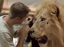 trophy-taxidermist-with-lion.jpg