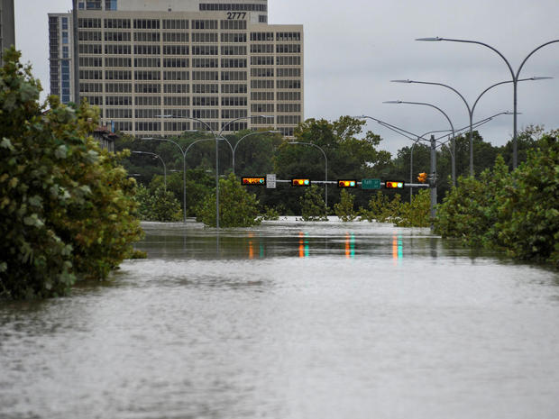 A downtown street is submerged in water from Buffalo Bayou after Hurricane Harvey inundated the Texas Gulf coast with rain causing widespread flooding, in Houston, Texas 