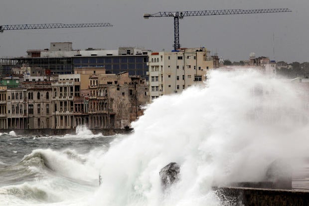 Waves crash against the seafront boulevard El Malecon ahead of the passing of Hurricane Irma, in Havana