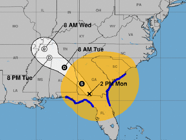 A map shows the projected path for the remnants of Hurricane Irma as of 2 p.m. ET on Sept. 11, 2017. The blue lines represent coastal areas under tropical storm warnings. Areas potentially affected by sustained tropical-storm-force winds are represented in orange.