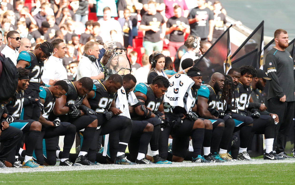 Nfl Players Kneel Raise Fists Lock Arms During National Anthem Cbs News 