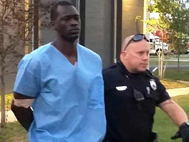Emanuel Kidega Samson, 25, is taken to jail by police in Nashville, Tennessee, Sept. 24, 2017.
